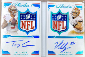 Flawless Duals Platinum Booklet Trey Lance, Nick Bosa